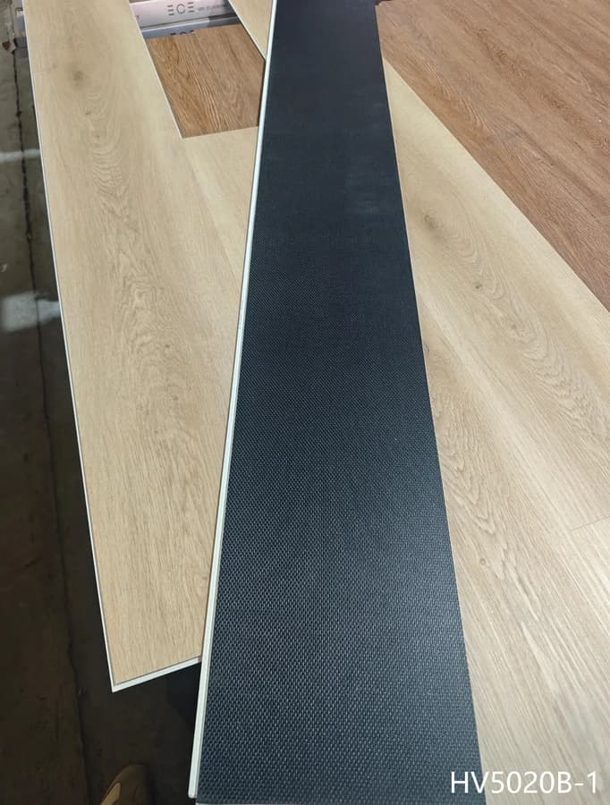 Light SPC flooring plank and attached pad
