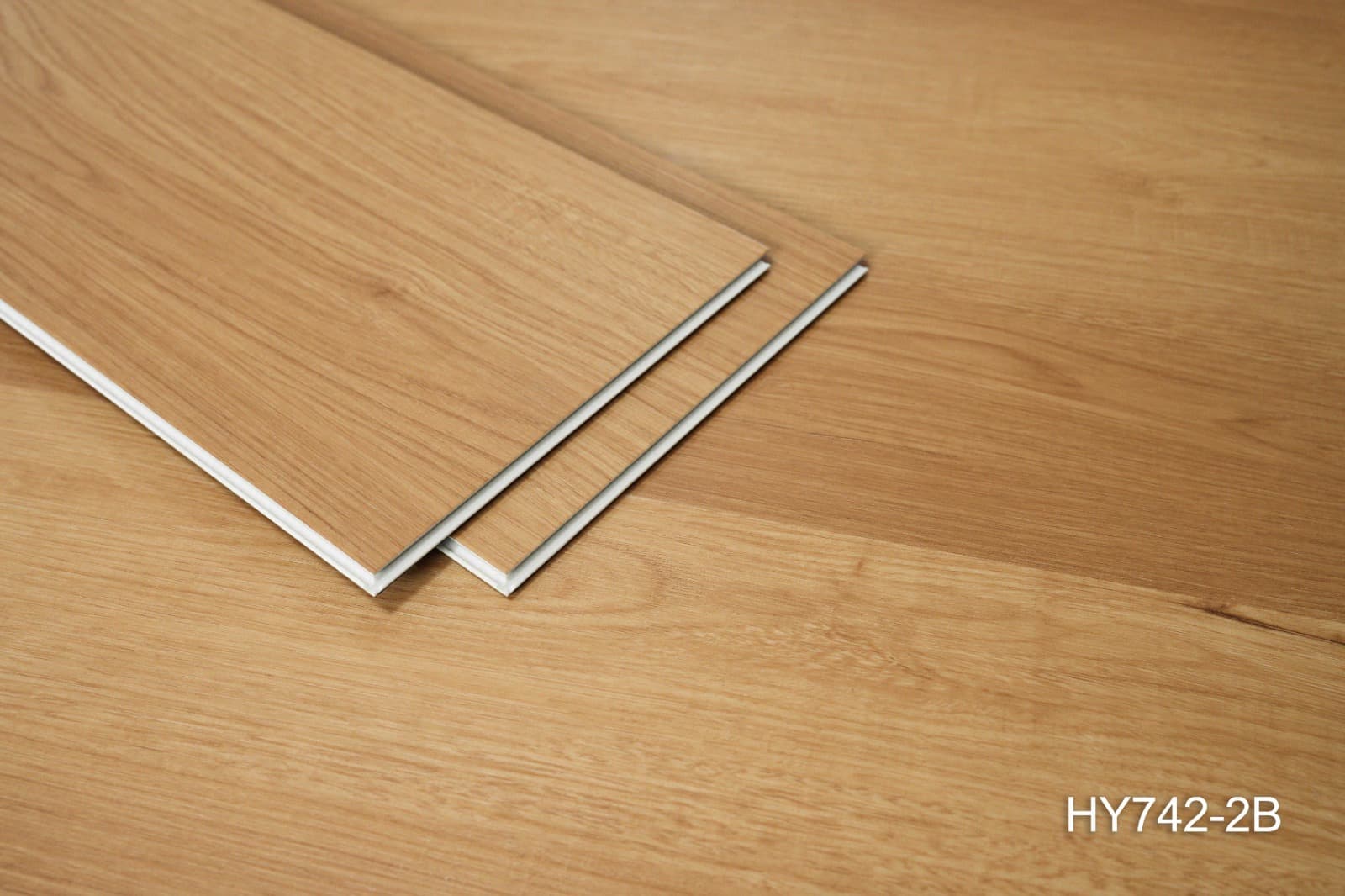 Stacked ProCraft planks showing the 7.5 mm board thickness