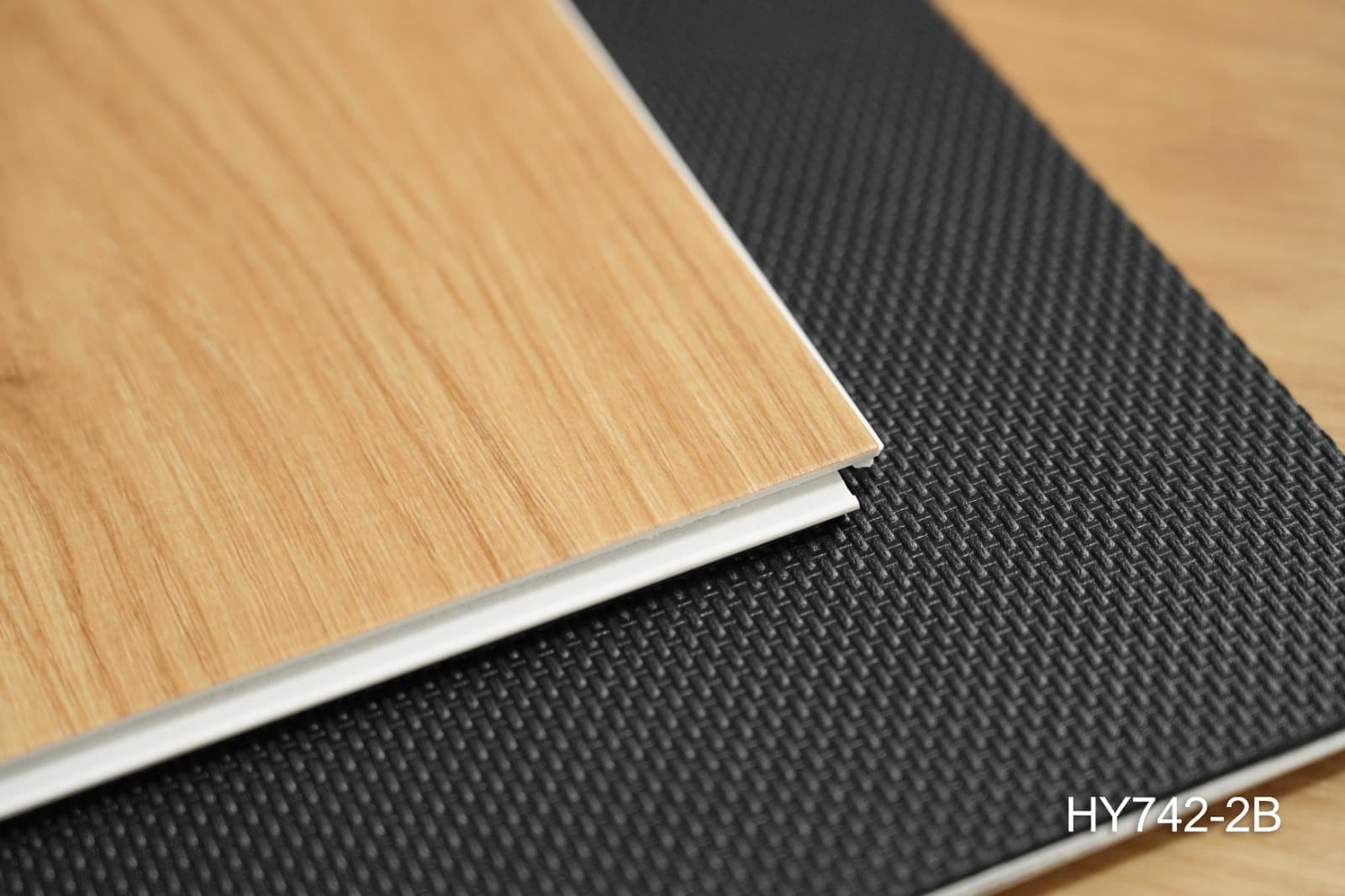Stacked ProCraft planks showing the 7.5 mm board thickness