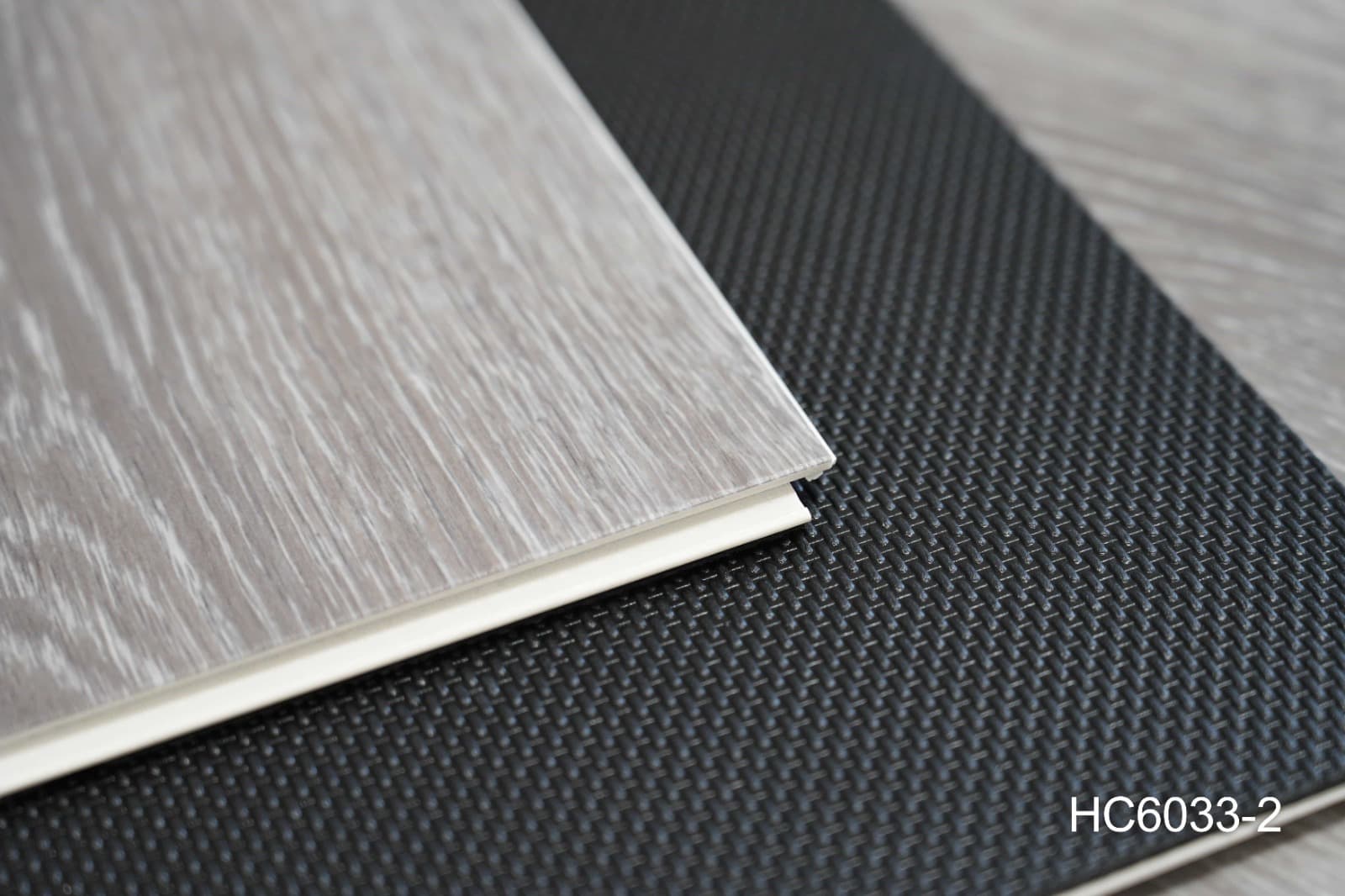 Stacked ProCraft planks showing the 7.5 mm board thickness